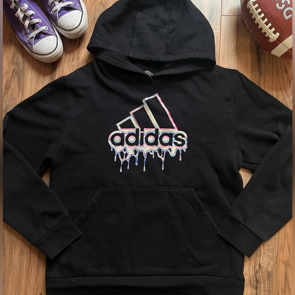 Kids black Adidas sweatshirt.